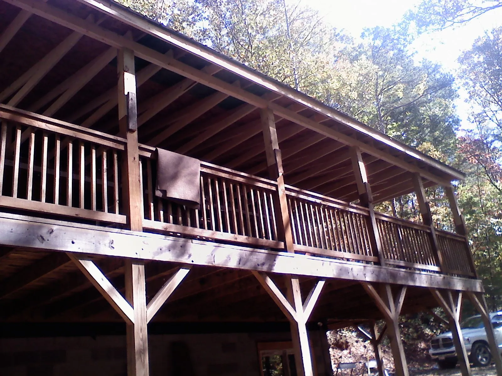 Timber framing under a new elevated porch and deck — Roof Leak Repair in Atkins by Roofing Brothers
